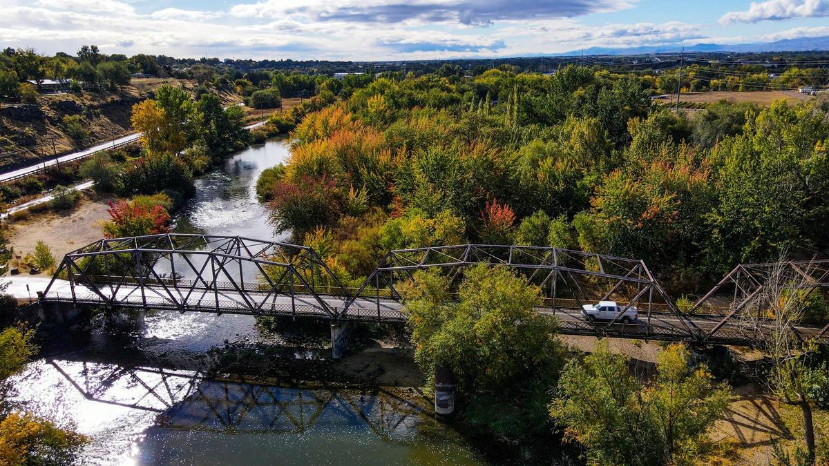 The Old Highway 30 Bridge in Caldwell was built in 1922 and spans the Boise River. Evaluated to be in poor condition, motorists are required to stop and check for oncoming traffic before crossing the one-lane bridge. A plan may convert it to a greenbelt path.