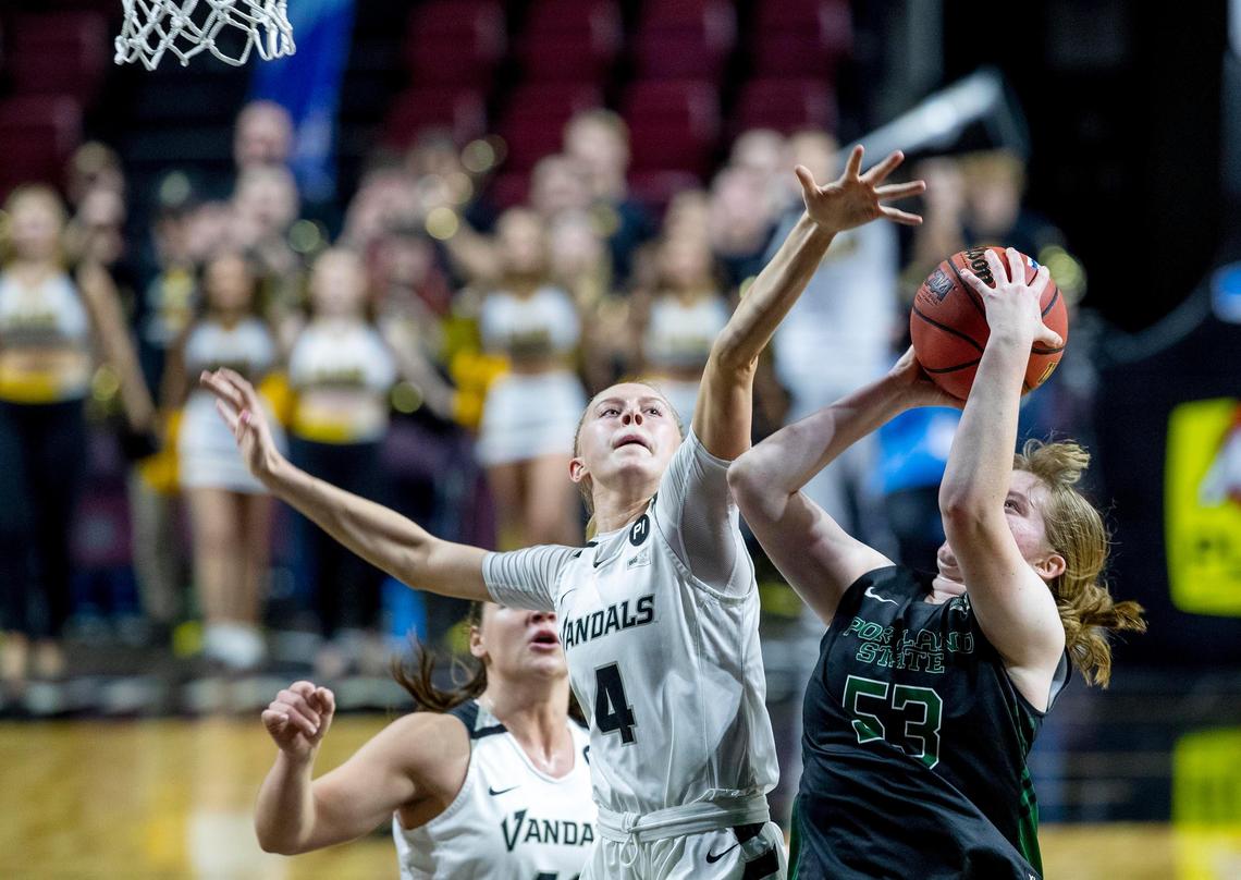 Idaho guard Hailey Christopher defends Portland State’s Desirae Hansen’s drive to tie the score with just a dozen seconds left in the Vandals’ 56-54 win in the Big Sky women’s basketball tournament Tuesday at CenturyLink Arena in Downtown Boise.