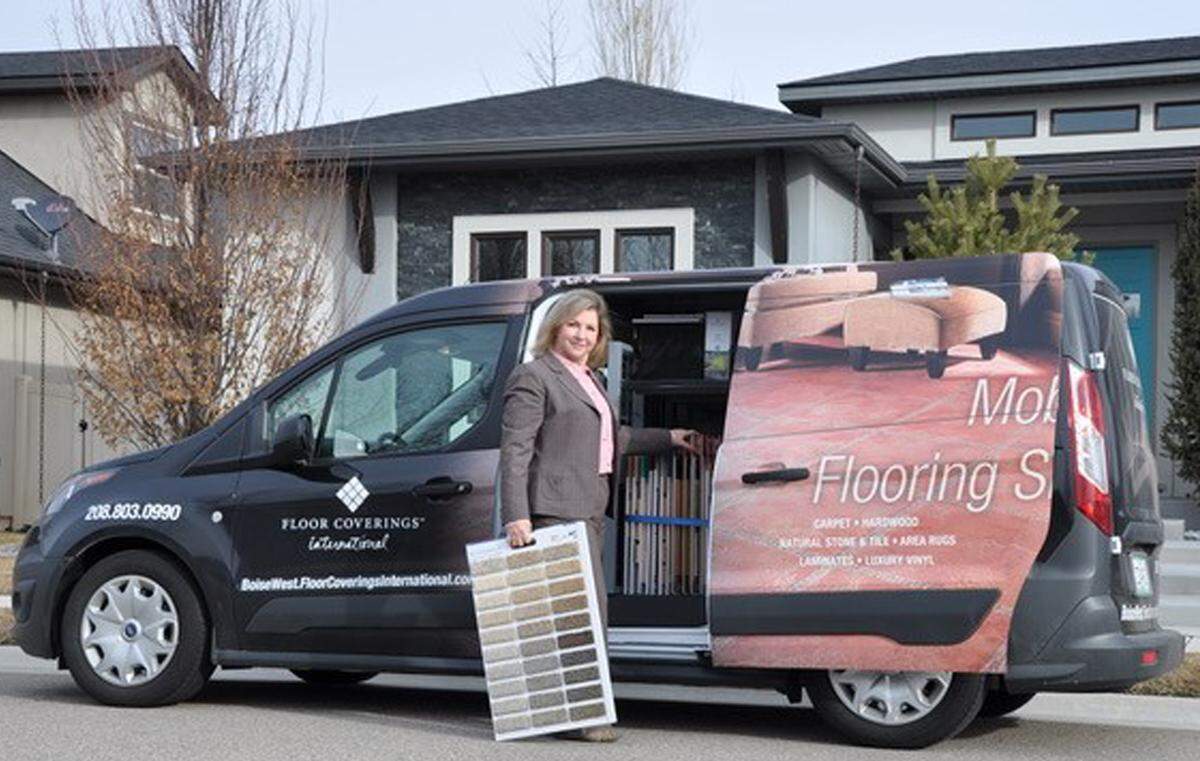 Carlee Cayton, owner of the new Floor Coverings International Boise West, with a mobile flooring showroom.