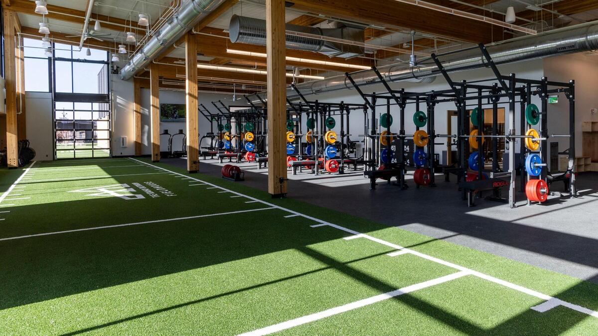 The Idaho Outdoor Fieldhouse boasts a large weigh-training room with space for floor exercise extending to the outside decks of the facility.