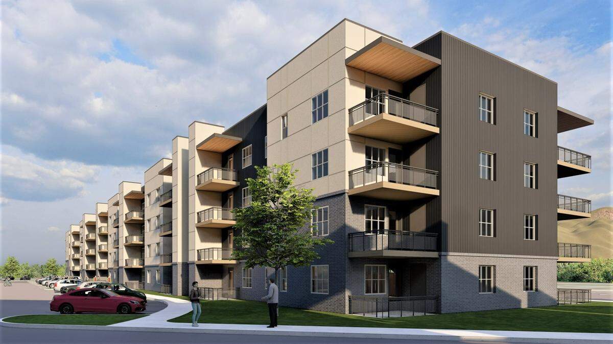 An architect’s rendering of a four-story apartment building in the planned 287-unit Canyon Ridge Apartments to be built at 2454 E. Gowen Road.