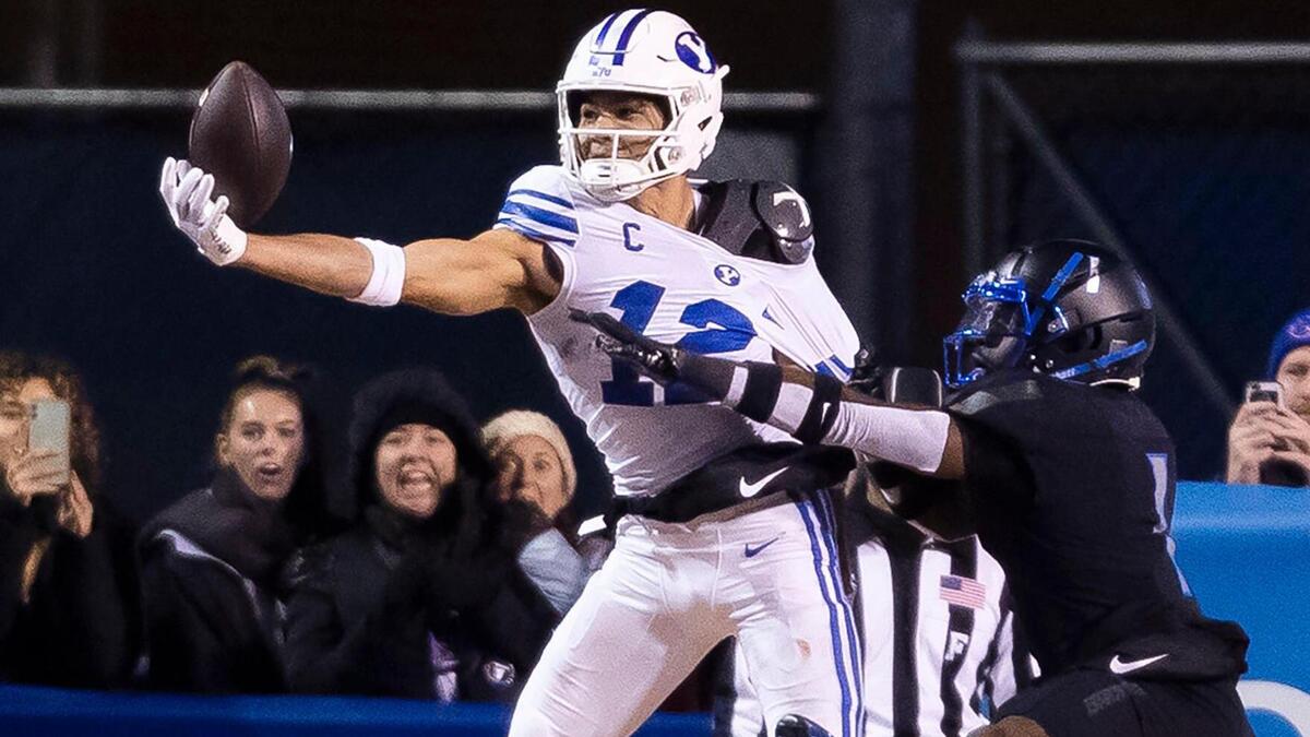 Boise State cornerback Caleb Biggers attempts to break up a pass in the end zone to BYU wide receiver Puka Nacua on what turned out to be the game-winning touchdown pass Saturday at Albertsons Stadium. BYU won 31-28.