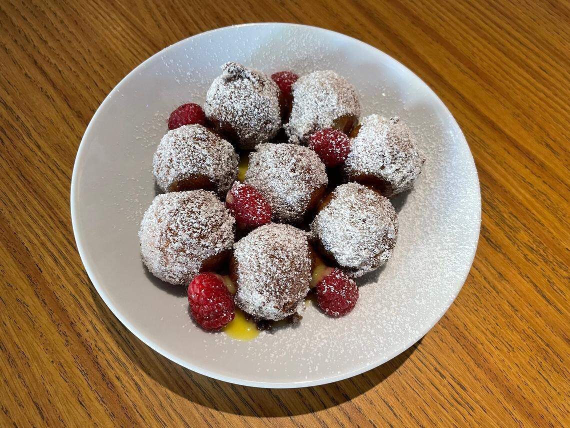 You need these hot doughnuts at The Modern Bar. Seriously.