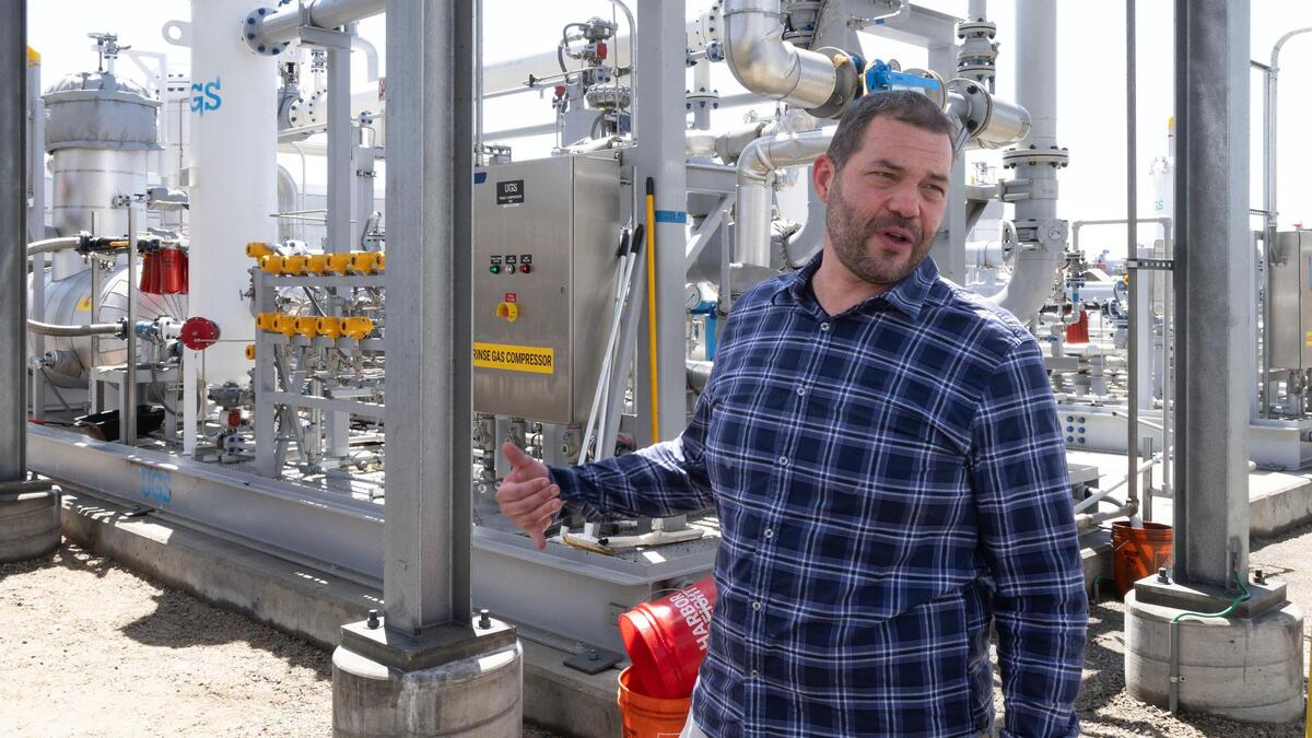 Ahren Tyron, CEO Biogas Development, describes the process of extracting and purifying methane from the Ada County Landfill at the new Hidden Hollow Energy plant near the landfill in Boise, June 17.