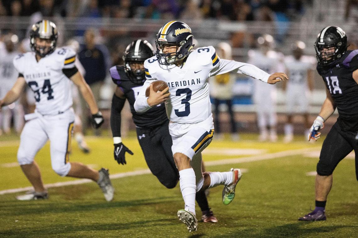 Meridian quarterback Malakai Martinez threw for three touchdowns Friday.