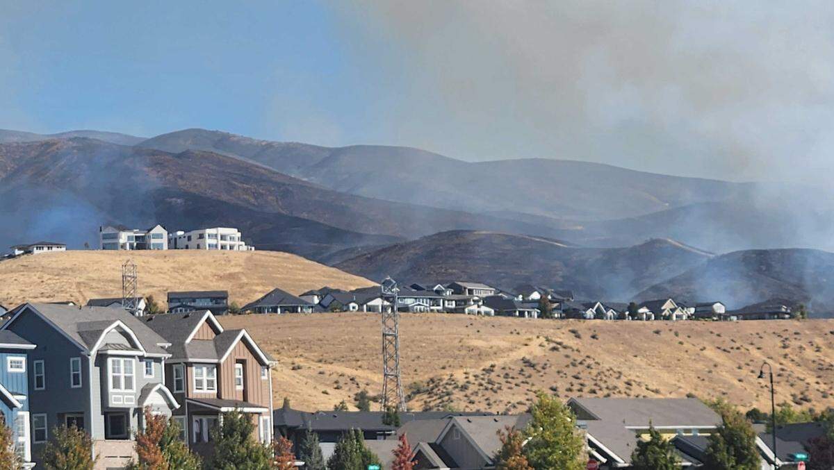 The Valley Fire burns near subdivisions along Warm Springs Avenue in the Boise Foothills Friday.
