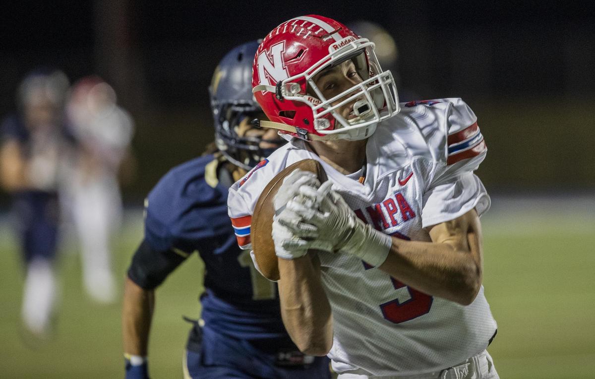 Nampa wide receiver Cade Smith hauls in a long pass in the fourth quarter at Middleton earlier this season.