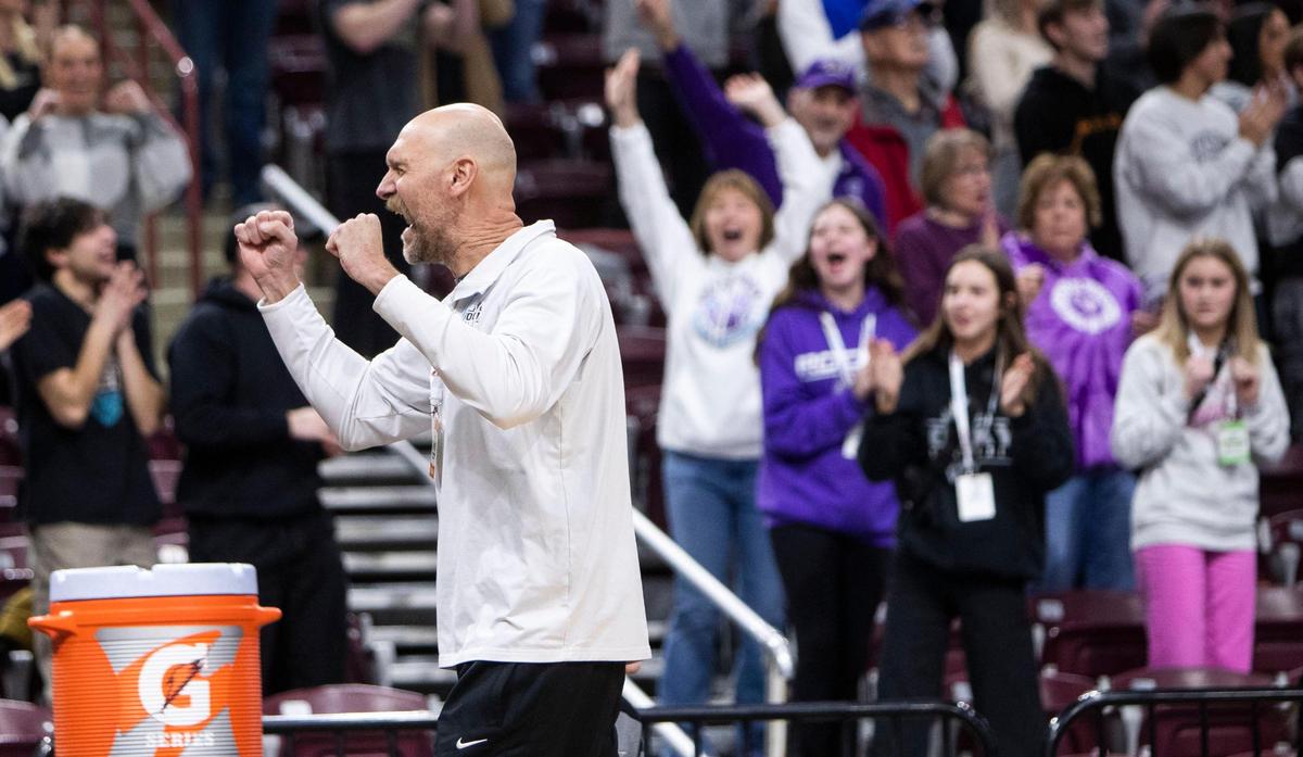 Rocky Mountain coach BJ Humphreys celebrates the Grizzlies’ 55-52 overtime win over Thunder Ridge on Thursday.