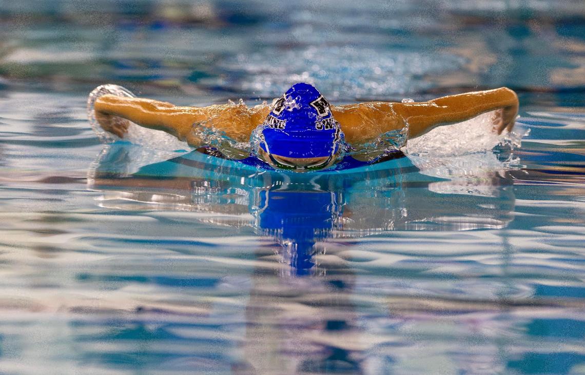 Timberline’s Kathy Nie competes in the 20-yard IM during the 5A state meet held at the West Family YMCA and Boise City Aquatic Center last season.