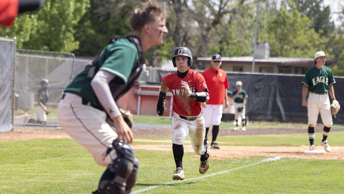Owyhee junior Matt Robertson runs from third to home during the fourth inning of their game against Eagle for the 6A District Three baseball tournament championship title, held at Fort Boise, Saturday, May 2, 2026. Owyhee won 4-2.