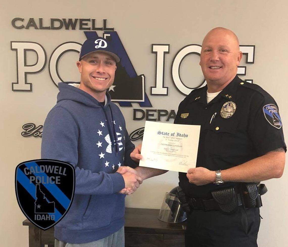 Ex-Caldwell Police Lt. Ryan Bendawald, left, poses with then-Police Chief Frank Wyant in 2018 after Bendawald received his certification from the Idaho Peace Officers Standards and Training. Bendawald has been indicted on seven felonies.