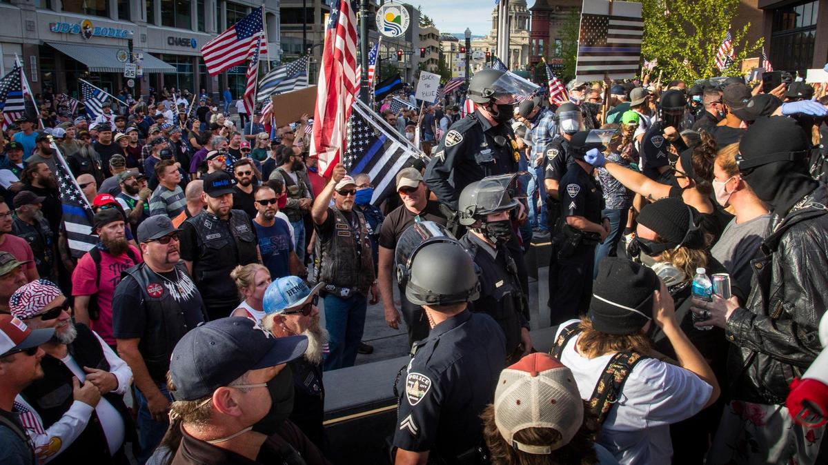 Boise Police create a barrier between Defund Police protesters that gathered in front of Boise City Hall and a large group of counterprotesters as tensions escalated in June 2020 in Downtown Boise. Political extremism has fueled hatred and divisions and it has to stop.