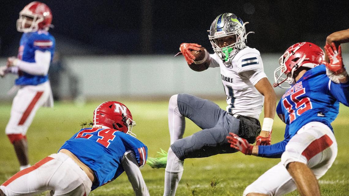 Mountain View wide receiver Makaii Pattwell look for running room while returning a punt Friday in a 44-0 win at Nampa in the first round of the 5A state playoffs.