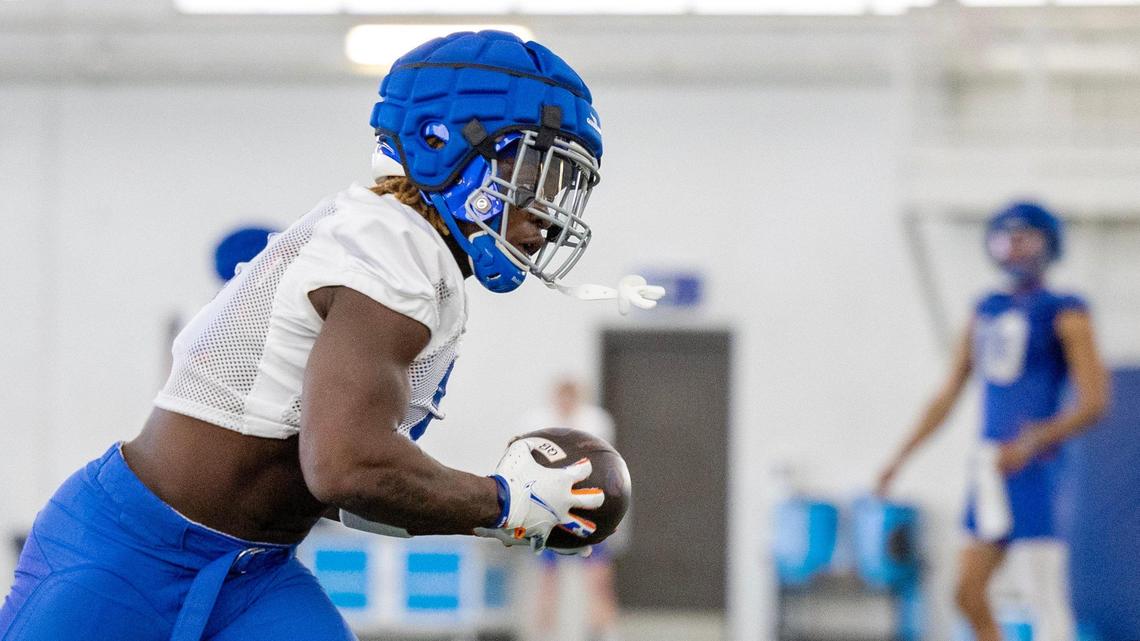 Boise State running back Ashton Jeanty runs a drill during the Broncos’ first spring practice on Thursday. Jeanty posted 821 yards and seven touchdowns on the ground last season.