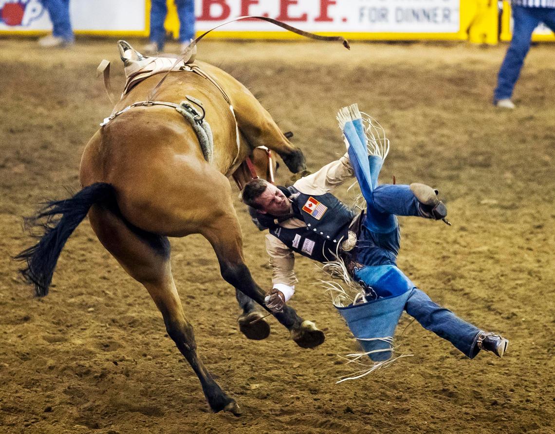 Orin Larsen of Manitoba, Canada, gets ejected from a horse named Come Down in the Snake River Stampede bareback bronc riding finals at the Ford Idaho Center in Nampa in 2019.