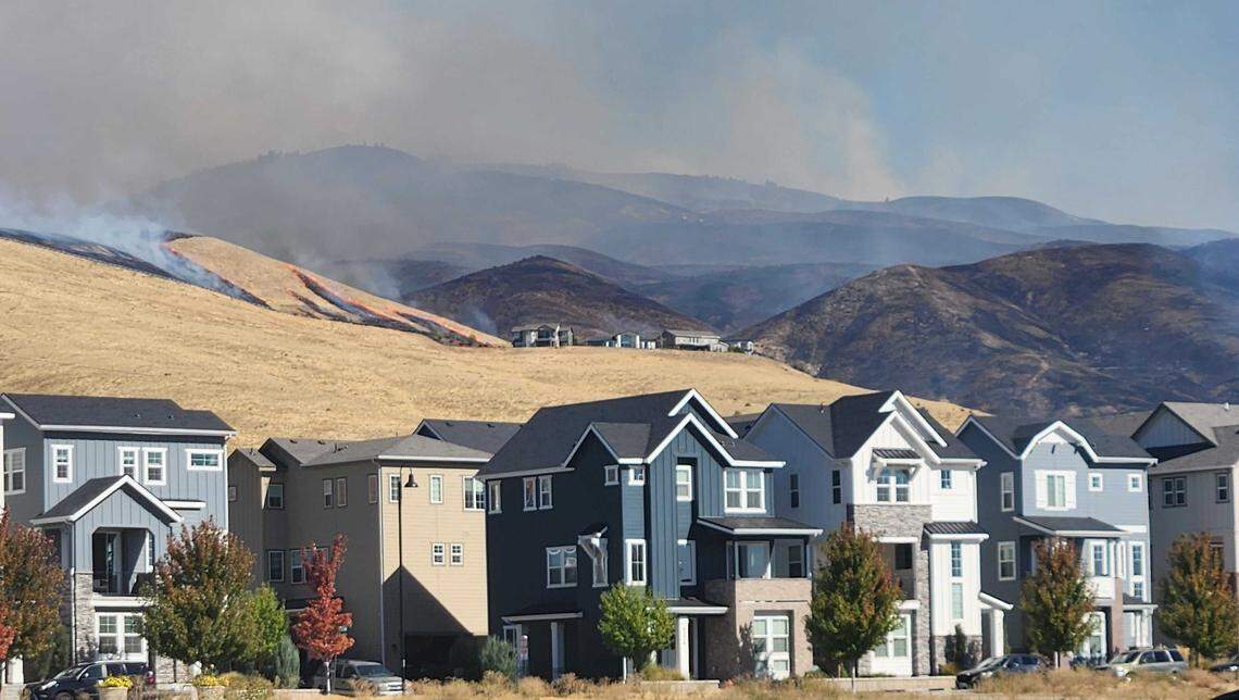The Valley Fire burns near subdivisions along Warm Springs Avenue Friday in the Boise Foothills.