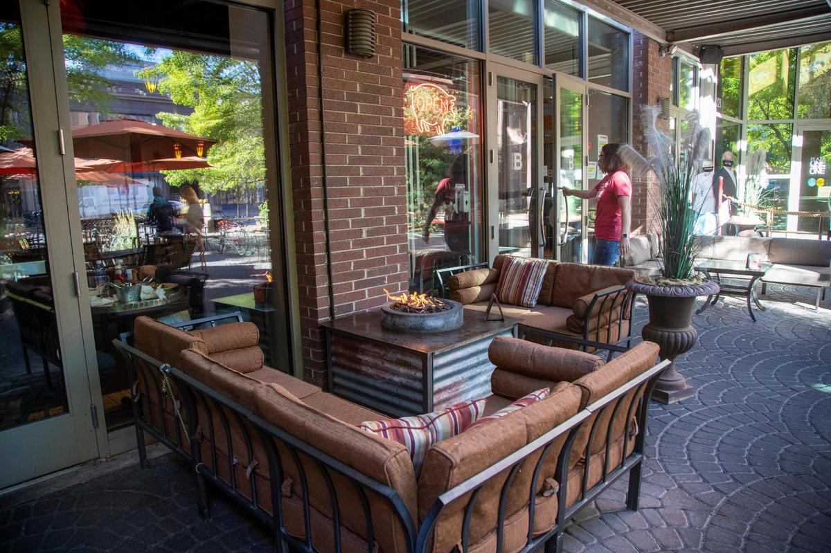 Bacon has an outdoor patio with a fire pit, plus 30 feet of overhead heating and standing heaters to keep diners toasty outdoors.