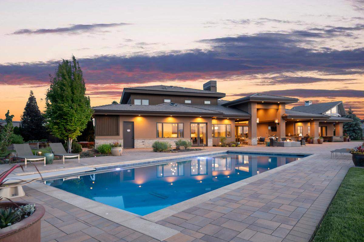 The $5.5 million home includes a large swimming pool in the back, shown here.