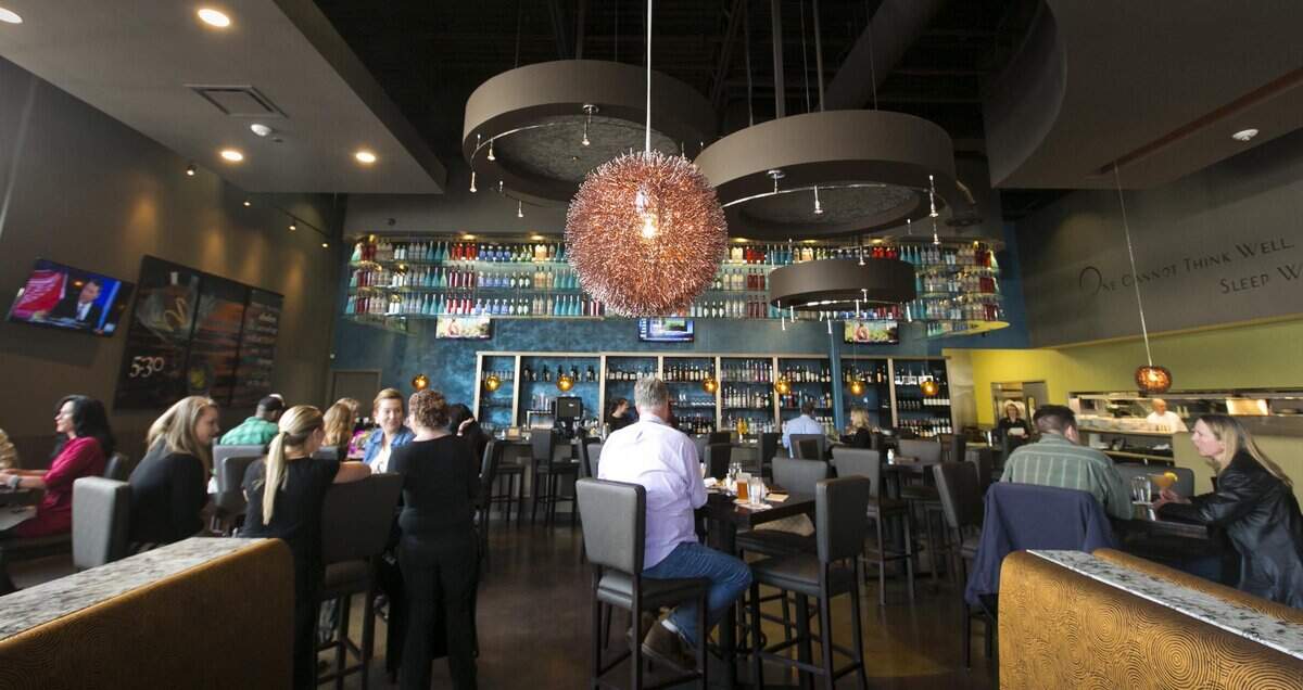 The large, open-spaced, blue-hued bar at Twigs offers a casual spot with stylish decor to sit with friends and choose from more than three dozen signature Martinis.