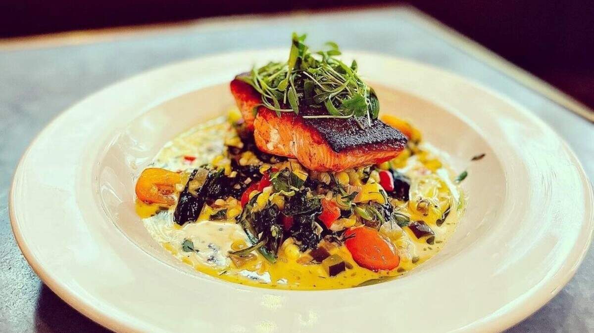 The menu at Little Pearl is known for much more than oysters. Pictured: Wild sockeye salmon.