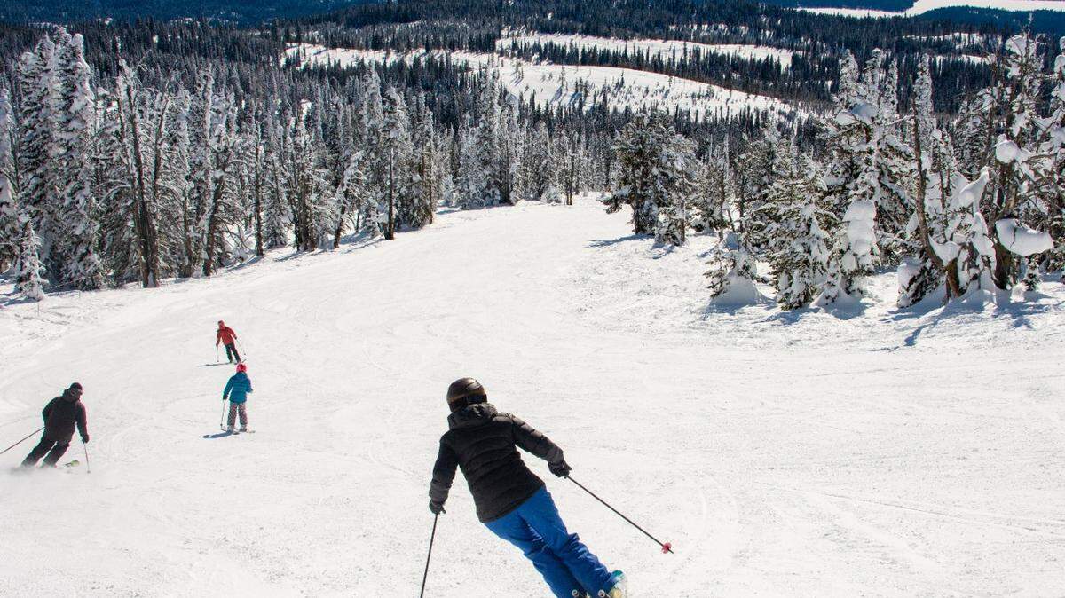 Skiers head down the slopes at Brundage Mountain in McCall, Idaho.