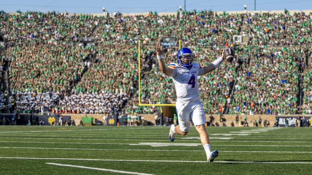 Boise State quarterback Maddux Madsen runs into the end zone for a touchdown against in the 2nd quarter against Notre Dame in South Bend, Ind., Saturday, Oct. 4, 2025.