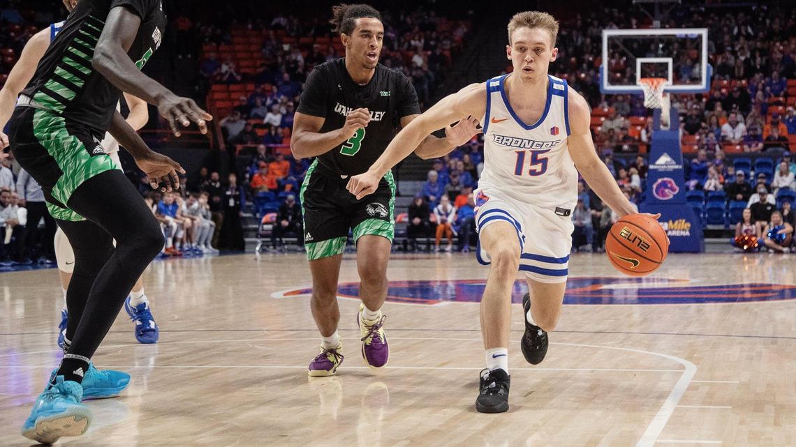 Boise State’s Jace Whiting dribbles the ball during the first half of a men’s basketball game against Utah Valley on Saturday at ExtraMile Arena.