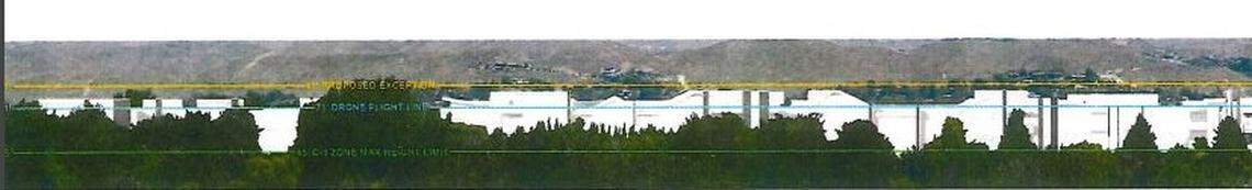 Joe Scott and Jamie Scott claim the Trapper’s Island housing development would diminish their views of Kathryn Albertson Park. The yellow line represents the 81-foot height proposed by developer Jayo Construction. The blue line represents 71 feet and the green line 45 feet. Jayo Construction says the impact to the views would not be that severe.