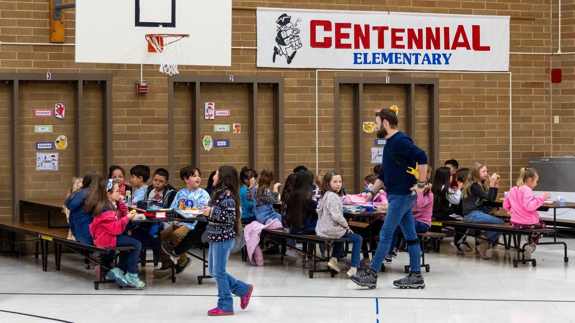 Students at Centennial Elementary in Nampa break for lunch in the school’s cafeteria in May 2024. The aging school is one of four schools that will be shuttered or repurposed within the Nampa School District because of enrollment declines.