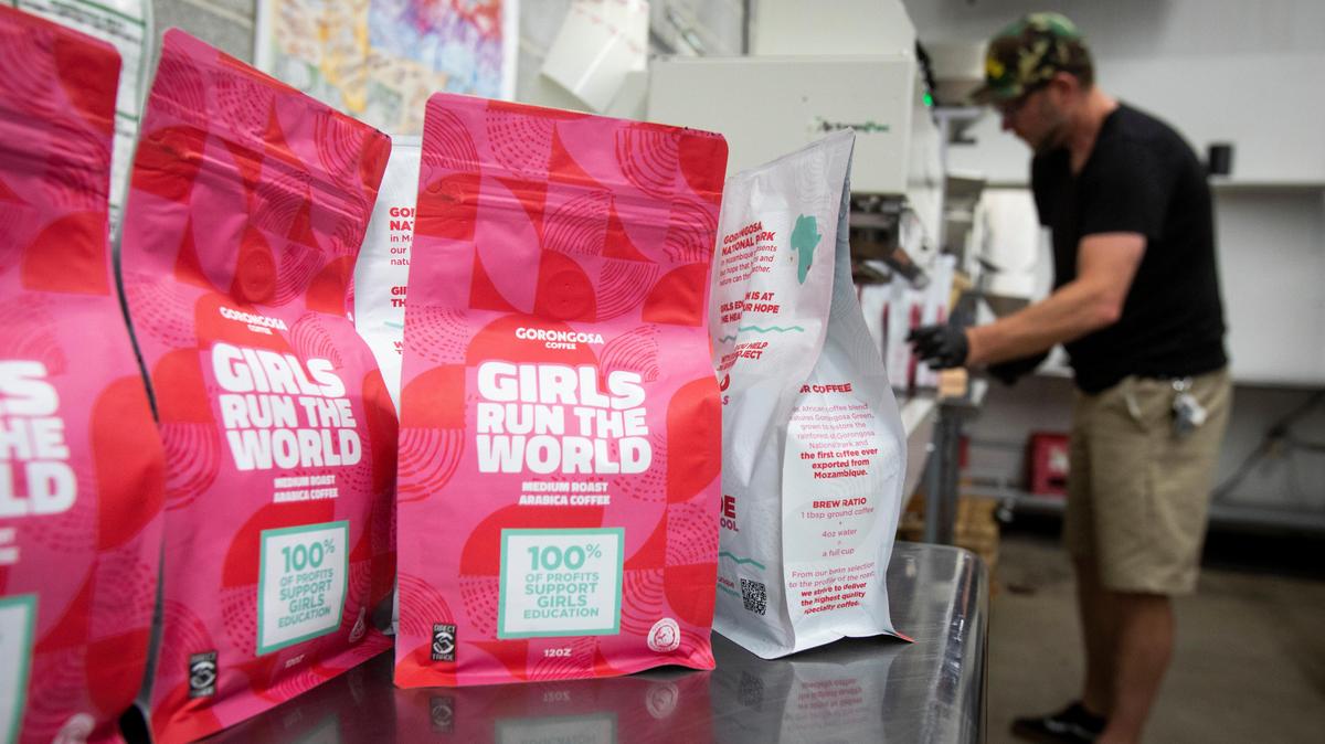 Shay Parks, with Boise’s Iron Mule Roasters, packages one of several roasts of Gorongosa Coffee. The various roasts support work, such as educational programs aimed at girls in families in and around in Gorongosa National Park in Mozambique.