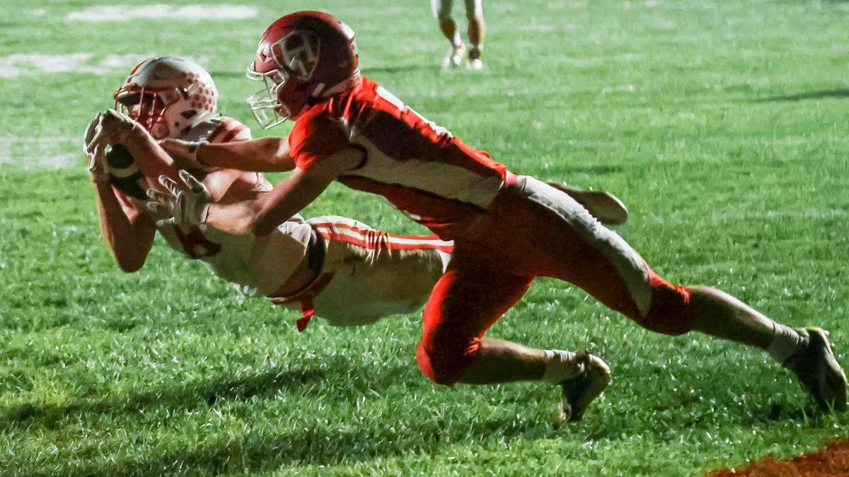 Weiser running back Brock Spencer dives into the end zone for a touchdown catch Oct. 15 at Homedale. The Wolverines (10-1) head to Gooding (9-0) for a 3A state semifinal at 7 p.m. Friday.