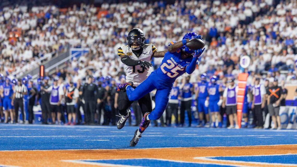 Boise State wide receiver Quinton Brown stretches to make a third-quarter TD catch in the win over App State.