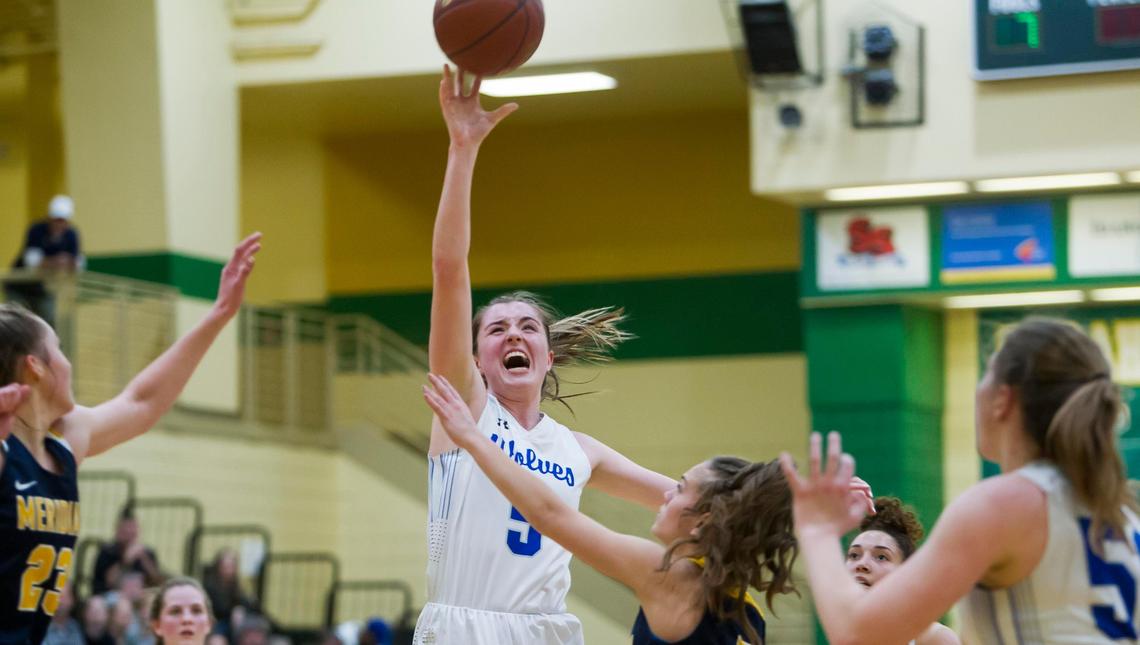 Timberline guard Ava Ranson scores on Meridian during the 5A District Three girls basketball semifinals Saturday at Borah.