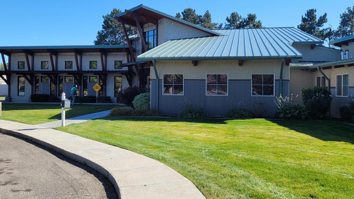 A lawn maintenance worker trims grass at the Hays House youth shelter in West Boise on Wednesday. The shelter for runaways and at-risk youth is not accepting new clients until it hires a dozen staff members to replace those who recently quit.