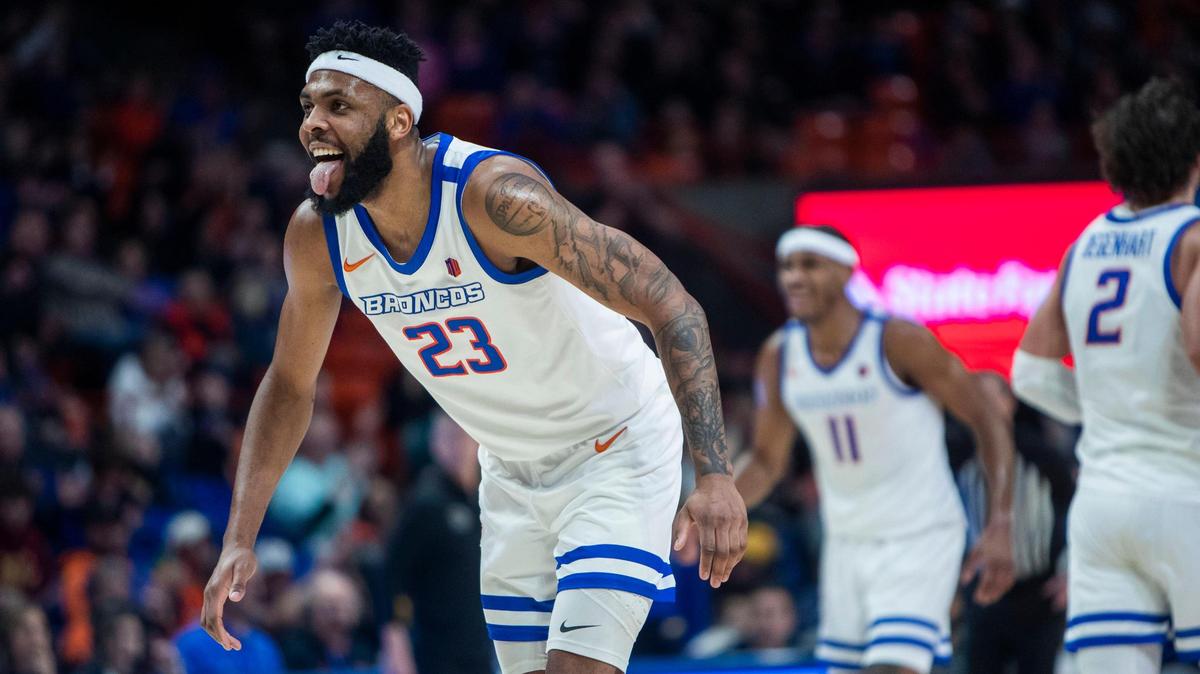 Boise State forward Naje Smith wears a big grin after a dunk against Mountain West foe Wyoming in the first half Feb. 11 at ExtraMile Arena in Boise.