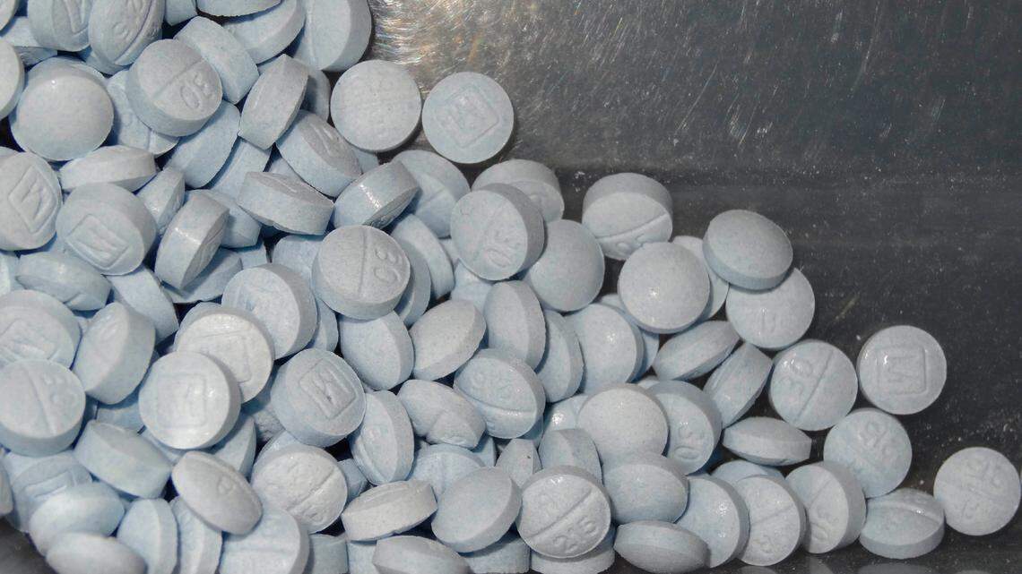 Fentanyl-laced fake oxycodone pills collected during an investigation in Utah. Five people died of suspected fentanyl overdoses in a Commerce City, Colorado, apartment, officials say.
