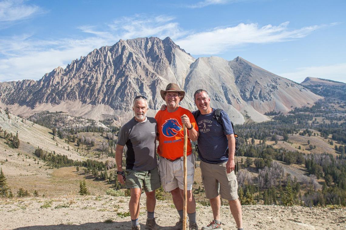 Among the historic events that he was a part of in his 23-year tenure as executive director of Idaho Conservation League, Rick Johnson is proud of the collaborative work that got the Cecil D. Andrus-White Clouds Wilderness designated. On a trip shortly after the legislation was signed, Johnson, left, Rep. Mike Simpson and his chief of staff, Lindsay Slater, led a trip to Castle Peak in the newly designated wilderness area.