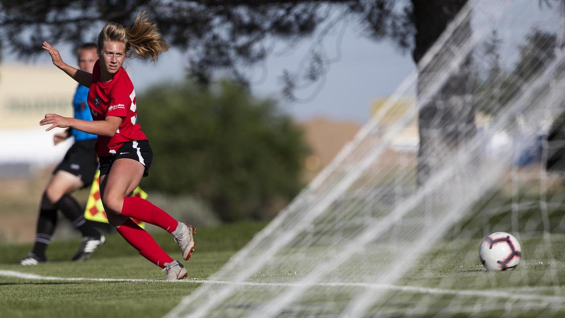 Avery McBride passes center for an assist to Boise Thorns teammate Kyndra Lyons. Lyons’ first-half goal put the score at 2-1 in favor of Utah Celtic FC during the girls U-15 Far West Regional championship match Sunday, June 23, 2019 at Simplot Sports Complex in East Boise.
