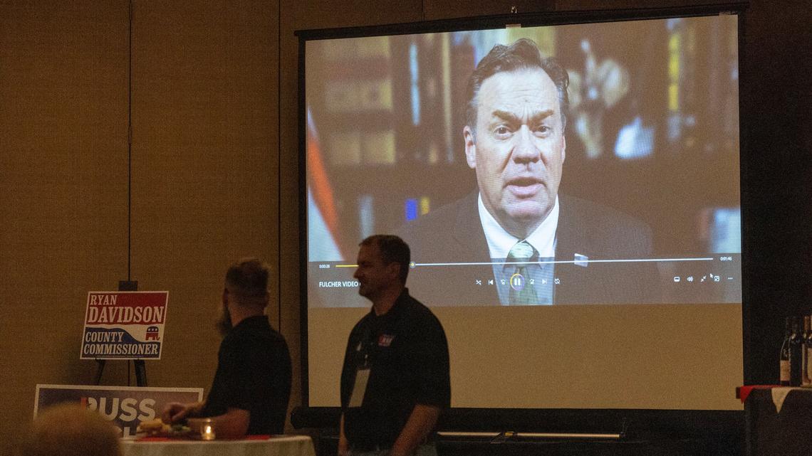 Congressman Russ Fulcher. R-Idaho, speaks via a recorded video message at the Republican Party election night watch party Tuesday at The Riverside Hotel in Garden City.