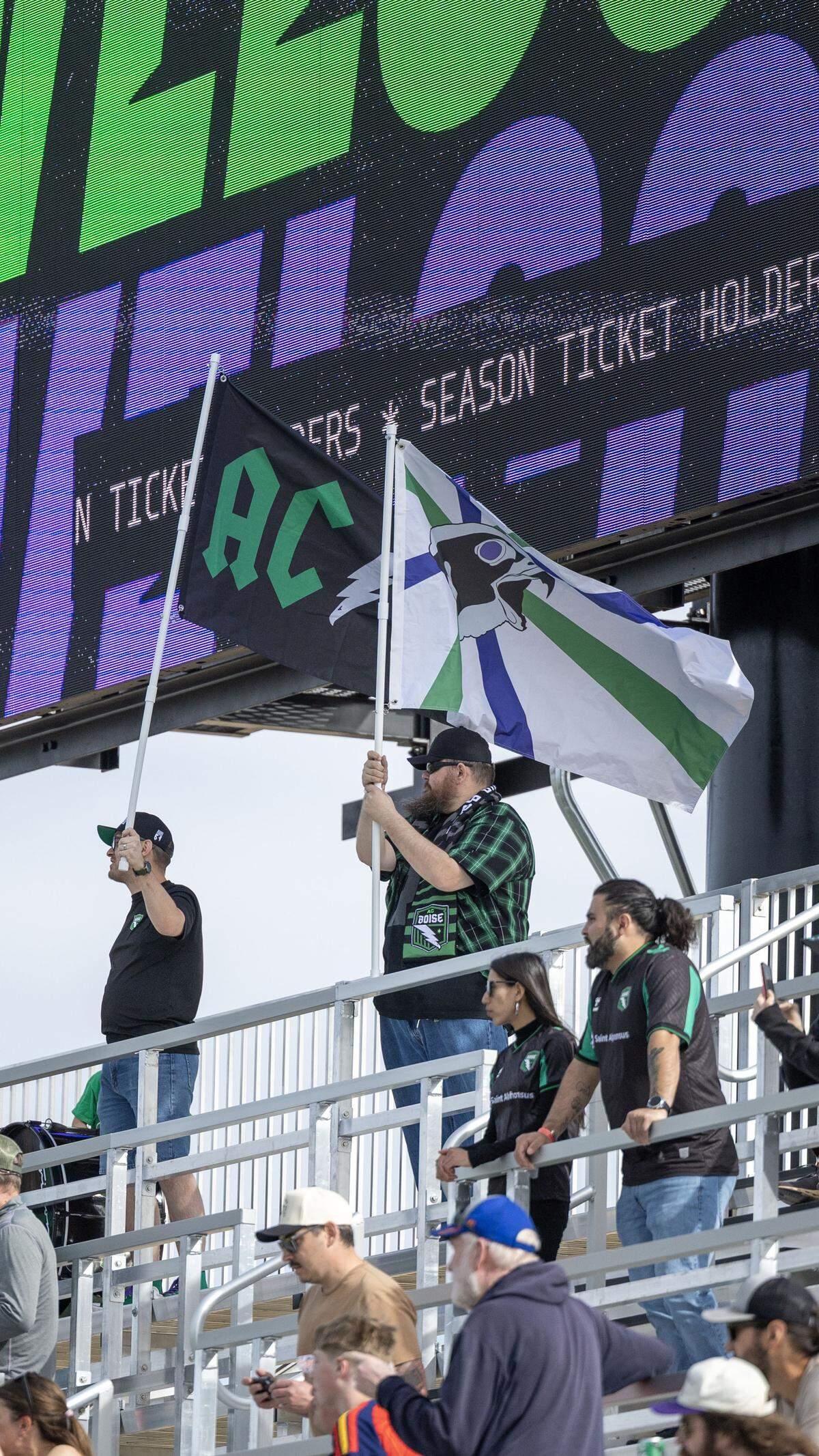 Athletic Club Boise fans in the Supporter Section fly their team flags at Fan Fest, Saturday, March 28, 2026.