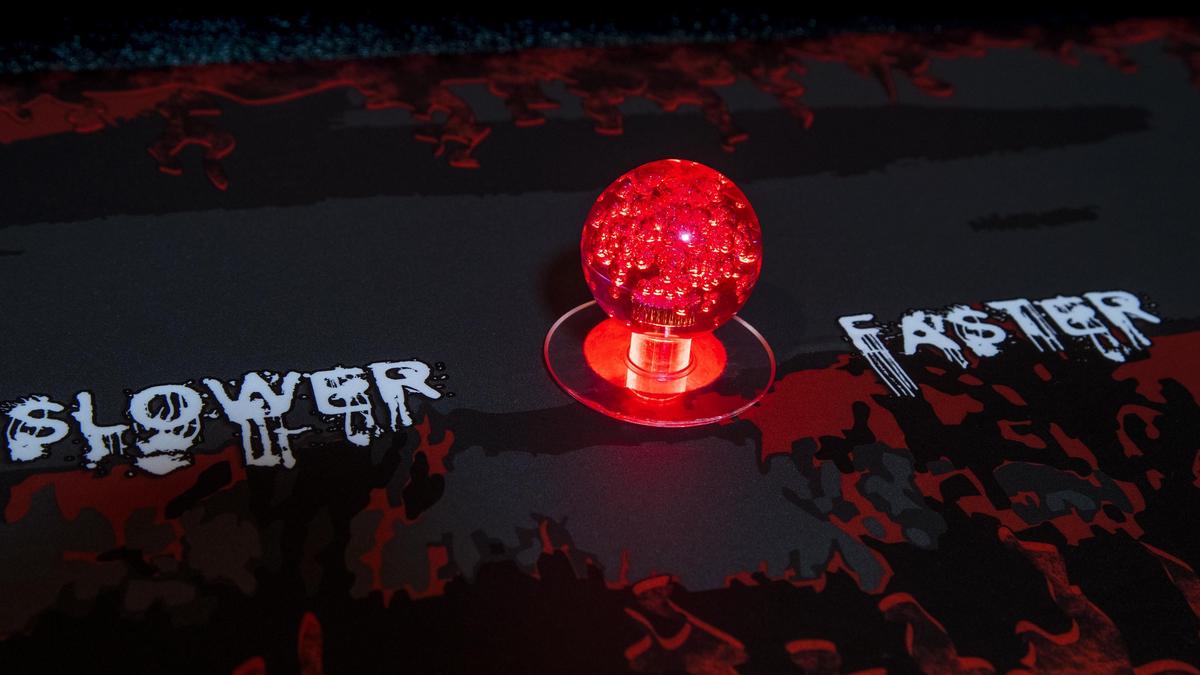 The joystick for Cecil Run is simple with only one other control button that jumps a retro graphic of a lion across gaps or to avoid dangerous arrows.