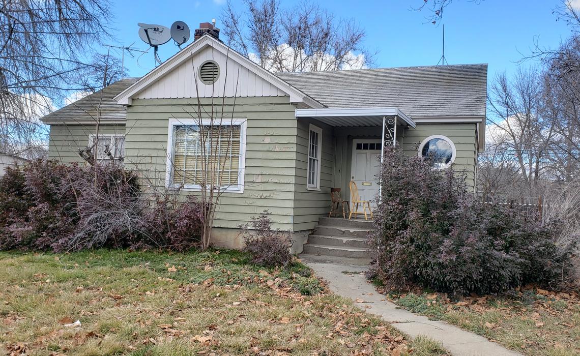This house on the northwestern corner of 25th and Bannock streets would be razed to allow for nine condominiums proposed by Trig Point Capital of Denver. The neighborhood consists of single-family homes.