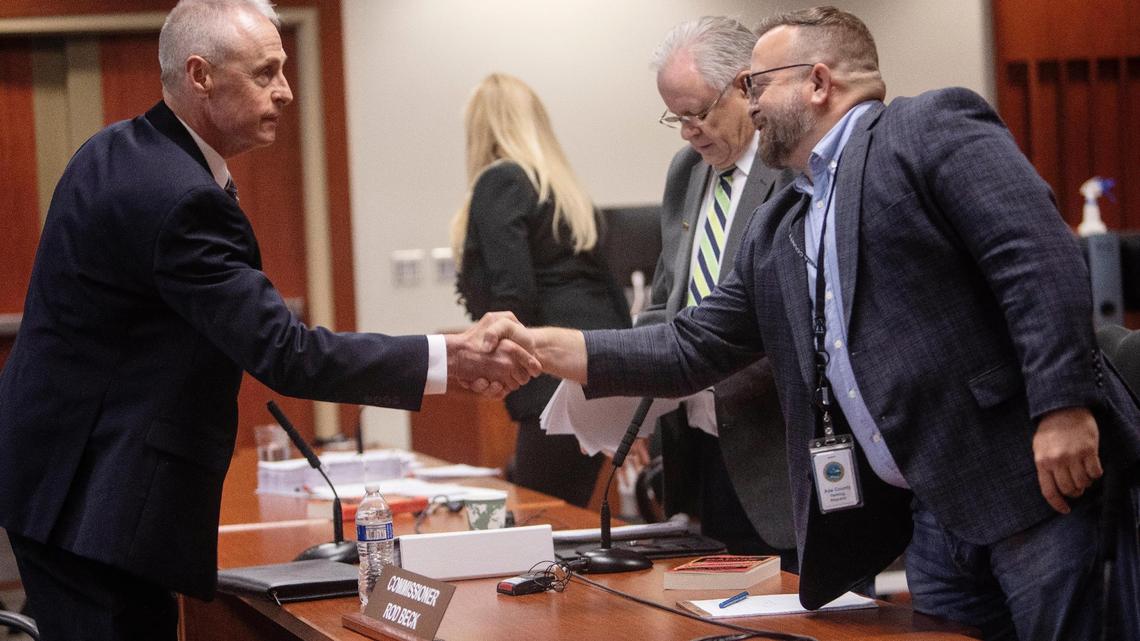 Mike Chilton shakes hands with Ada County Commissioner Ryan Davidson before his interview for the vacated sheriff’s position. Interviews were conducted at the Ada County Courthouse on Wednesday in Boise.