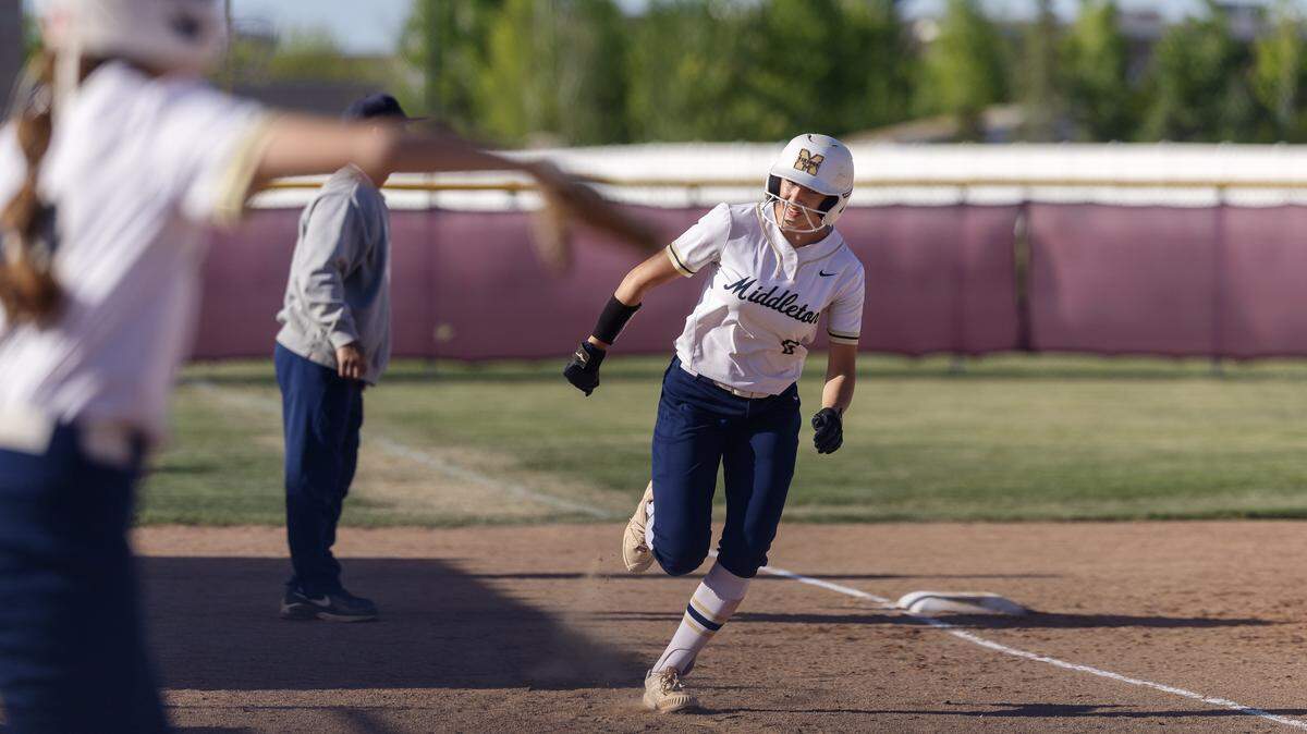 Middleton junior Sammy Miller comes in for a run in the 5A District Three softball championship game against Vallivue, Thursday May 7, 2026, at Columbia High School.