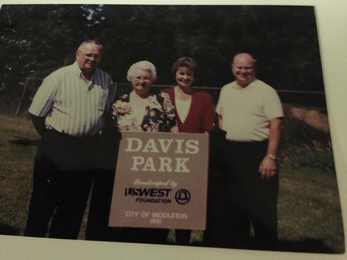 Dorothy Davis stands with her three children, Larry and Kenny Davis and Kaye Henderson, at the newly dedicated Davis Park in 1992.