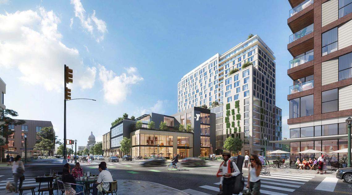 An architect’s rendering of the proposed new Treasure Valley Family YMCA building in downtown Boise, center. This rendering also shows a 20-story apartment building that would be built behind the YMCA at 10th and Jefferson streets, as part of Edlen & Co.’s proposal to redevelop the area as sought by Boise’s urban renewal agency. Another, smaller apartment building also would be built at right in this image.