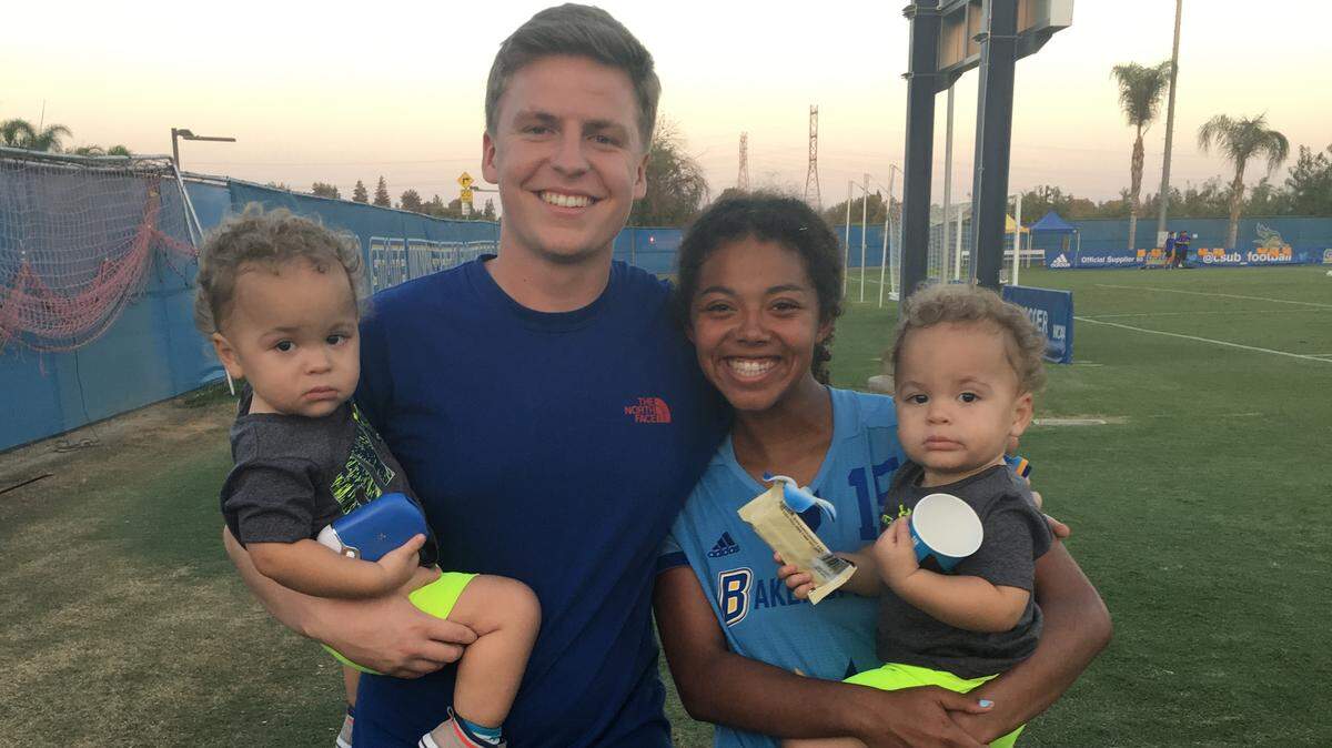 Mountain View High grad Keneika Jensen poses with her husband Makade and twin boys Easton and Jaren after a Cal State women’s soccer game this fall.