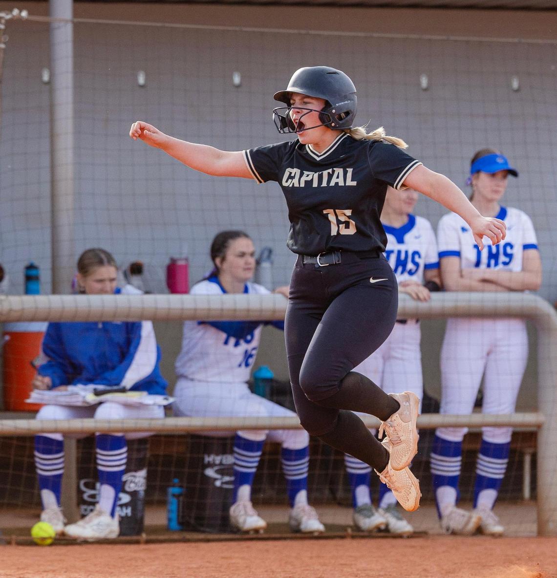 Capital senior Keyten Erickson celebrates scoring a run during the Eagles’ seventh-inning rally, which gave them a win over Timberline in the 6A state tournament.