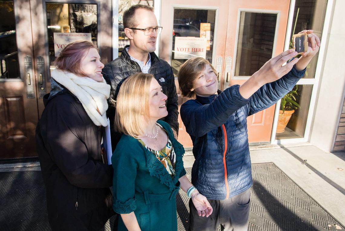 City council member and mayoral candidate Lauren McLean, center, poses for a pre-voting selfie with husband Scott McLean, son Aiden, and daughter Madeleine at Cathedral of the Rockies on Nov. 5, 2019.