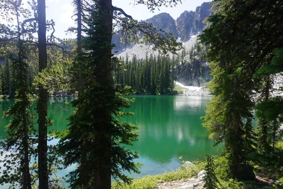 Middle Rainbow Lake is one of a series of Idaho mountain lakes that are accessible via the trail in the Boise National Forest.